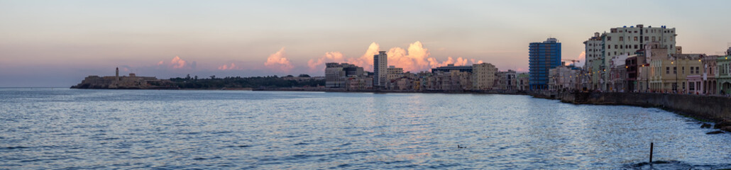 Panoramic view of the Old Havana City, Capital of Cuba, during a colorful cloudy sunset.