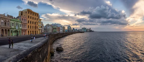Acrylic prints Havana Panoramic view of the Old Havana City, Capital of Cuba, by the ocean coast during a dramatic cloudy sunset.