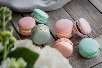 Close up colorful macarons dessert with vintage pastel tones