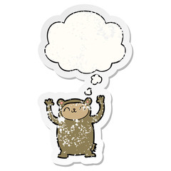 cute cartoon bear and thought bubble as a distressed worn sticker