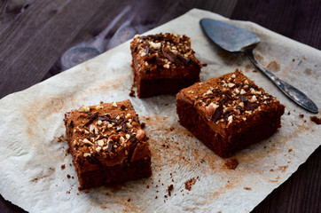 chocolate cake on the wooden table papper