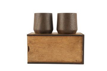Wooden handmade glasses in a box on a white background, isolate.