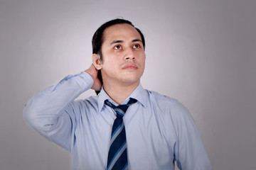 Confused Businessman Thinking Expression