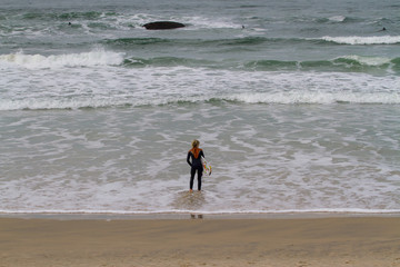 man walking on the beach