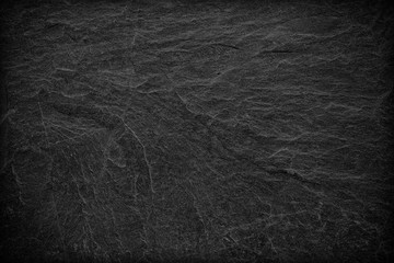 Dark grey black slate background or texture. black stone
