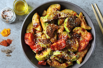 Vegan bowl with braised sesame zucchini. Healthy diet. Keto diet.