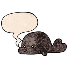 cartoon baby seal and speech bubble in retro texture style