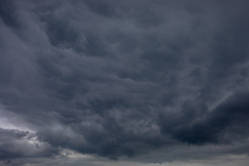 Fototapeta premium The black cloud comes drove the thunder and lightning