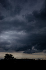 Obraz na płótnie Canvas The black cloud comes drove the thunder and lightning