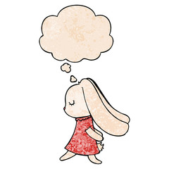 cute cartoon rabbit and thought bubble in grunge texture pattern style