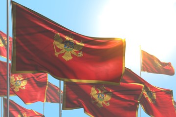 cute holiday flag 3d illustration. - many Montenegro flags are wave on blue sky background