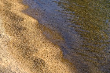 pristine clear waters and fine sands of Lake Tahoe