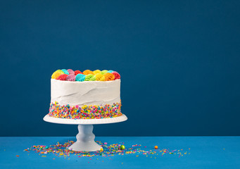 Colorful Birthday Cake over Blue