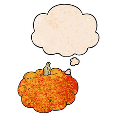 cartoon pumpkin and thought bubble in grunge texture pattern style