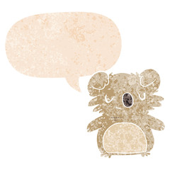 cartoon koala and speech bubble in retro textured style