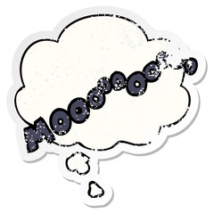 cartoon moo noise and thought bubble as a distressed worn sticker