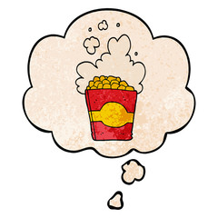 cartoon popcorn and thought bubble in grunge texture pattern style