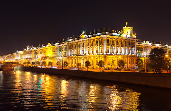 St. Petersburg summer evening. View from the Neva River to the Palace Embankment and the Hermitage Museum. Beautiful urban landscape. Night city background