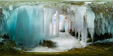 Ice cave grotto on Olkhon Island, Lake Baikal, covered with icicles. Spherical panorama 360vr