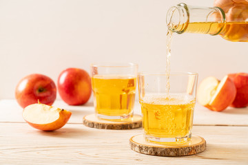 Apple juice with red apples fruits
