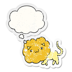 cartoon lion and thought bubble as a distressed worn sticker