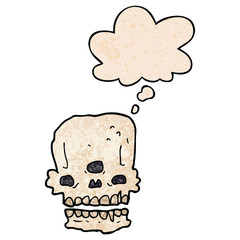 cartoon spooky skull and thought bubble in grunge texture pattern style