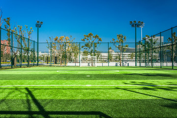 Panoramic view of soccer field stadium and stadium seats © evening_tao
