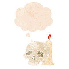 cartoon spooky skull and candle and thought bubble in retro textured style