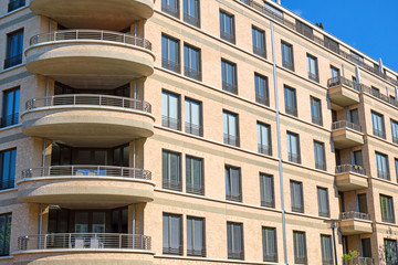 Detail of a beige apartment house seen in Berlin, Germany