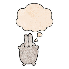 cartoon rabbit and thought bubble in grunge texture pattern style