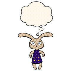 cute cartoon rabbit and thought bubble in comic book style