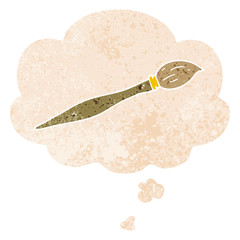 cartoon paint brush and thought bubble in retro textured style