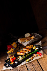 Delicious  grilled sausage with various grilled vegetables