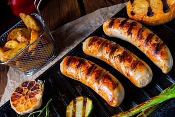Delicious  grilled sausage with various grilled vegetables