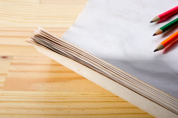 Stationery on wooden background