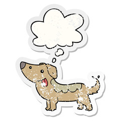 cartoon dog and thought bubble as a distressed worn sticker