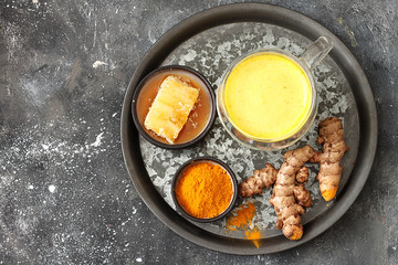 Traditional indian drink turmeric golden milk .Top view, flat lay, copy space 