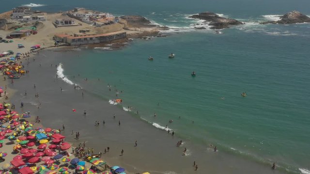 Pullback aerial view of Tuquillo beach, Peru