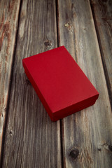 Empty red box on brown wooden