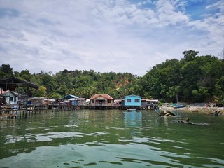 Borneo sea gypsy water village or house on stilts view in Gaya island, Kota Kinabalu. Sabah,...