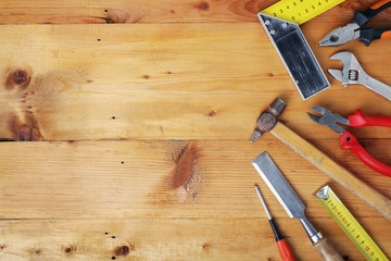 Working tools on wooden rustic background with copy space