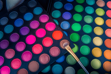  Palette of multicolor cosmetic make up, eye shadow palette, colorful shadows texture in round color circles