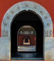 Arch door within arch door with traditional Chinese style of architecture, decoration and tiles in...