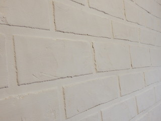 The background wall of this white brick plaster