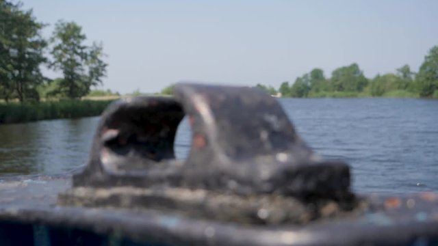 Old black ore mount on a ship. RACK FOCUS, SLOW MOTION