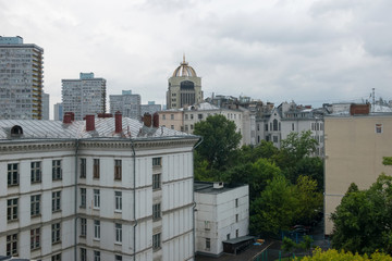 Fototapeta na wymiar View of the roofs of residential buildings in Moscow's New Arbat Street