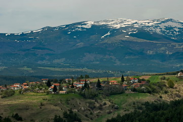 Fototapeta na wymiar Village of Plana - Plana mountain and Vitosha in the distance Bulgaria