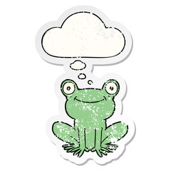 cartoon frog and thought bubble as a distressed worn sticker