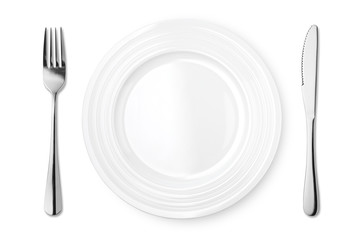 Empty plate with fork and knife isolated on white background. Top view.