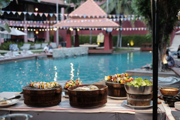 Barbecue party near pool